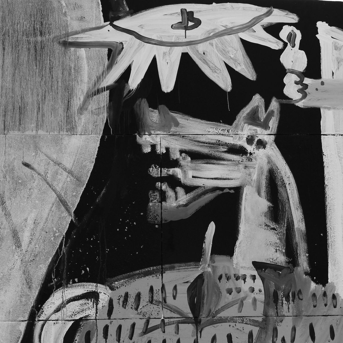 Close detail of the bull mural's side, showing the painted lightbulb-sun, a screaming horse head, and a human face turned upward, all rendered in black, white and grey.